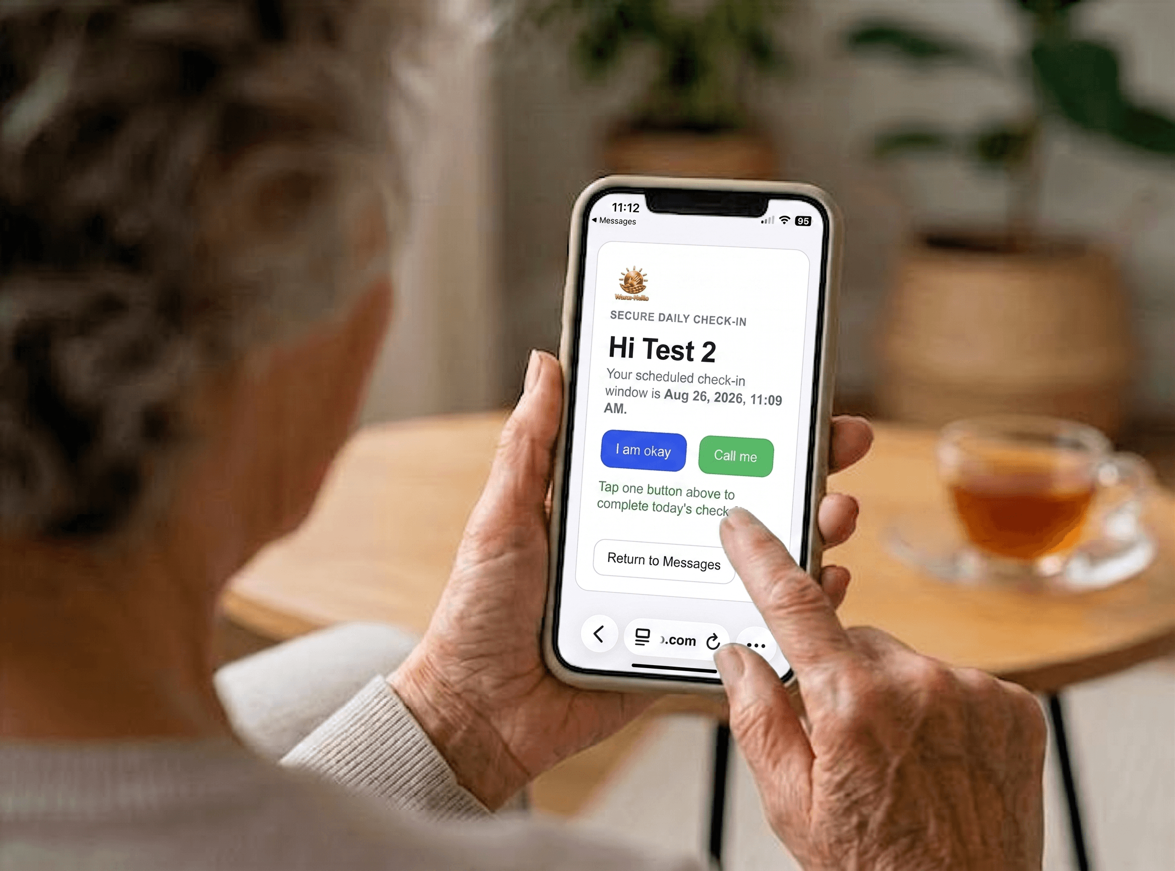 Senior woman living alone tapping a one-tap Warm-Hello daily SMS check-in on a smartphone at home.